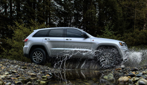 Jeep Grand Cherokee crossing a creek